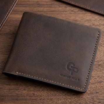 Класичне портмоне унісекс на магніті GRANDE PELLE 11208 Коричнева 11208 фото